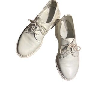 Well-loved Doc Martens.